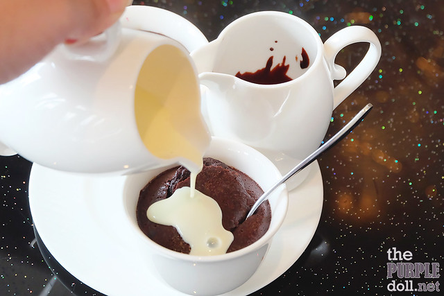Chocolate Fondant with cream and milk chocolate sauce
