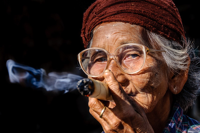 Burmese women smoking a cheroot