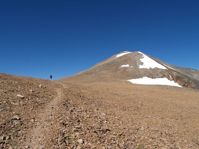 Vicki reaches Koip Pass, with Koip Peak on the right