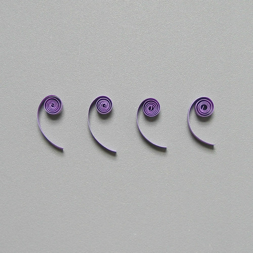 Close up of coils made with quilling slotted tools