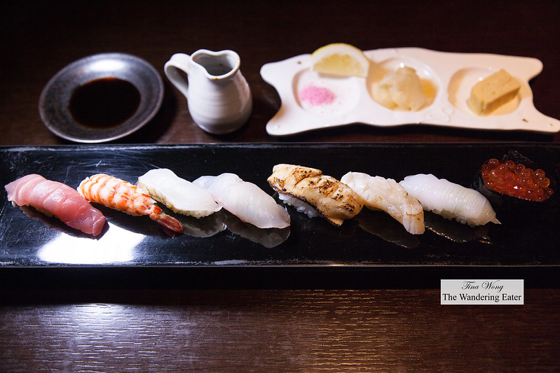 8-piece sushi platter made with local Okinawa fish - (left to right) Lean tuna (Akami Minami-maguro), prawn, Makubu (spelling?), Madai (Red sea bream), Torched conger eel, scallop, squid, ikura (salmon roe) maki