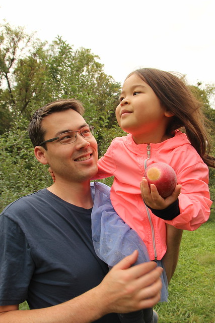 Mio picking apples with Daddy