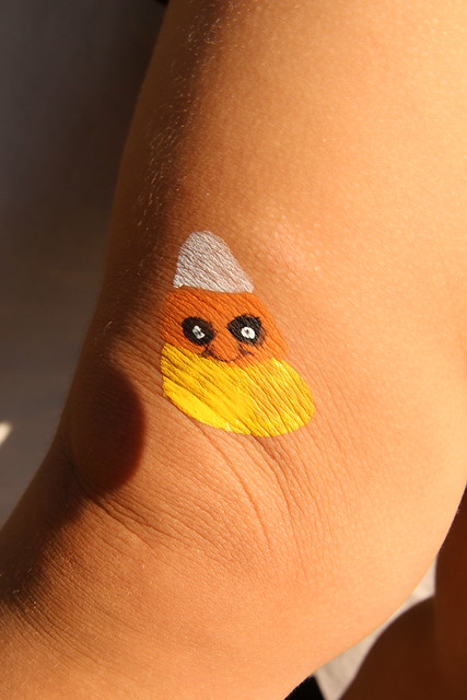 Cute candy corn on the knee!