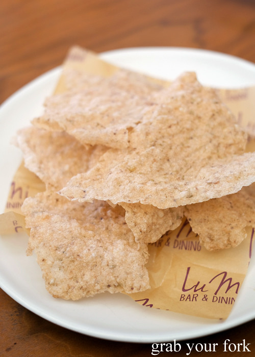 Buckwheat chips with salt and white vinegar at LuMi Dining in Pyrmont Sydney