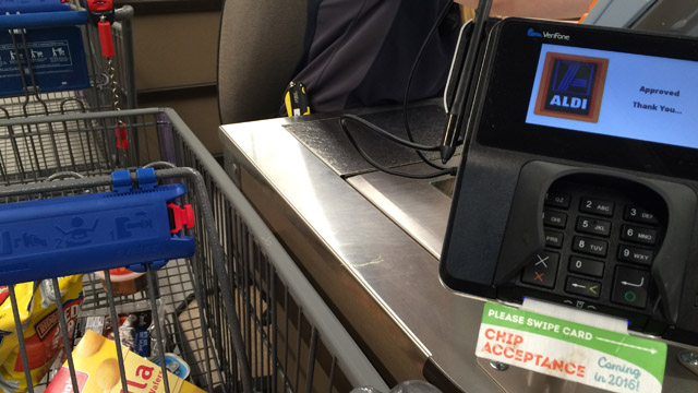 Aldi paying at register
