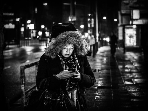 Woman with Mobile Phone; Night