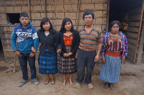 Scholarship student Felipa and her family outside their house