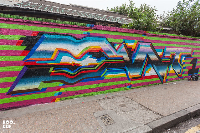 Felipe Pantone at work Painting A Mural in Shoreditch, London
