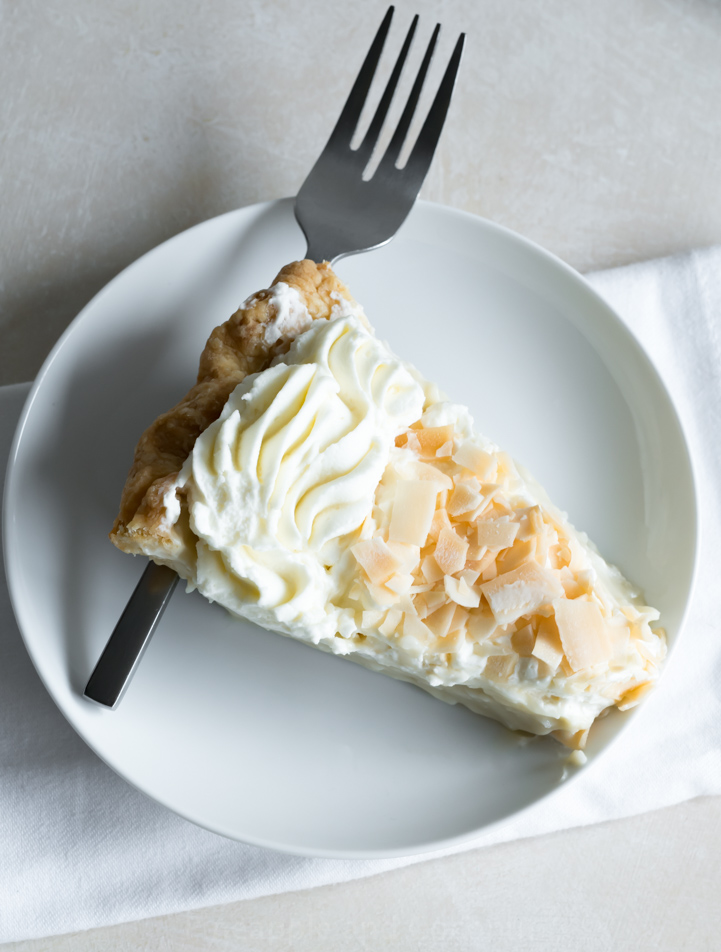 Boozy Coconut Cream Pie www.pineappleandcoconut.com #SlapstickFall #PieFight