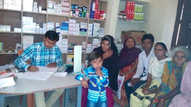 People waiting for their turn to get the medicines as prescribed by the doctor.jpg