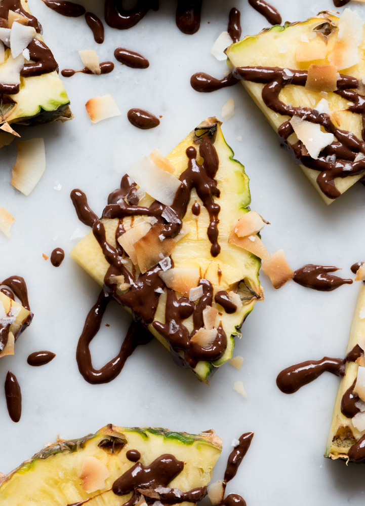 Dark Chocolate Drizzled Fresh Pineapple with Toasted Coconut and Sea Salt www.pineappleandcoconut.com