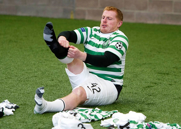 Celtic manager Neil Lennon takes part in a challenge for Red Nose Day 2013