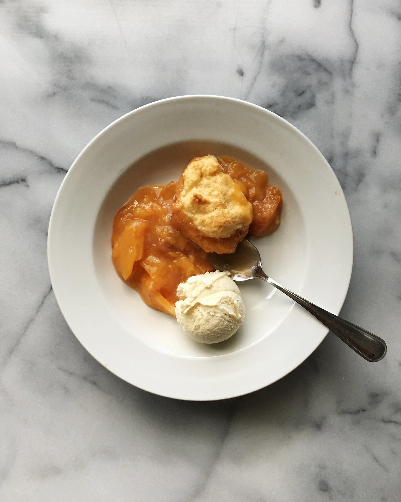 Old Fashioned Peach Cobbler from Kitchen in the Hills. This is a classic southern recipe that's simple to make and perfectly delicious!